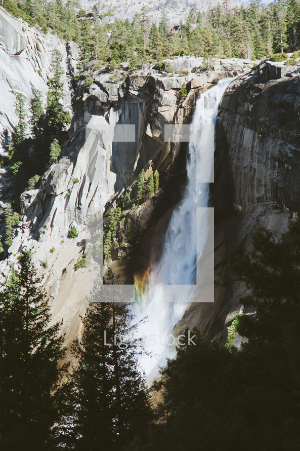 a waterfall off the side of a cliff 
