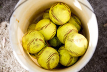 bucket of softballs 