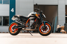 KTM Duke 890 motorcycle with orange wheels