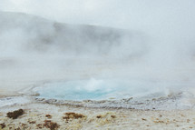 steam over a hot spring 