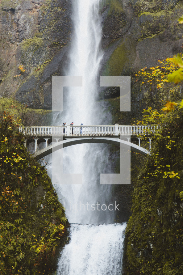 bridge over a ravine and waterfall 