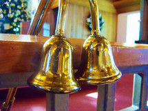 Brass candle lighters at church