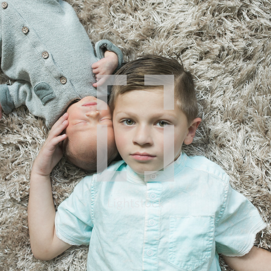 big brother and newborn baby brother portrait 
