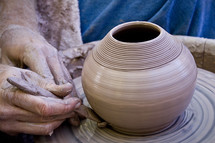 potter at a potters wheel 
