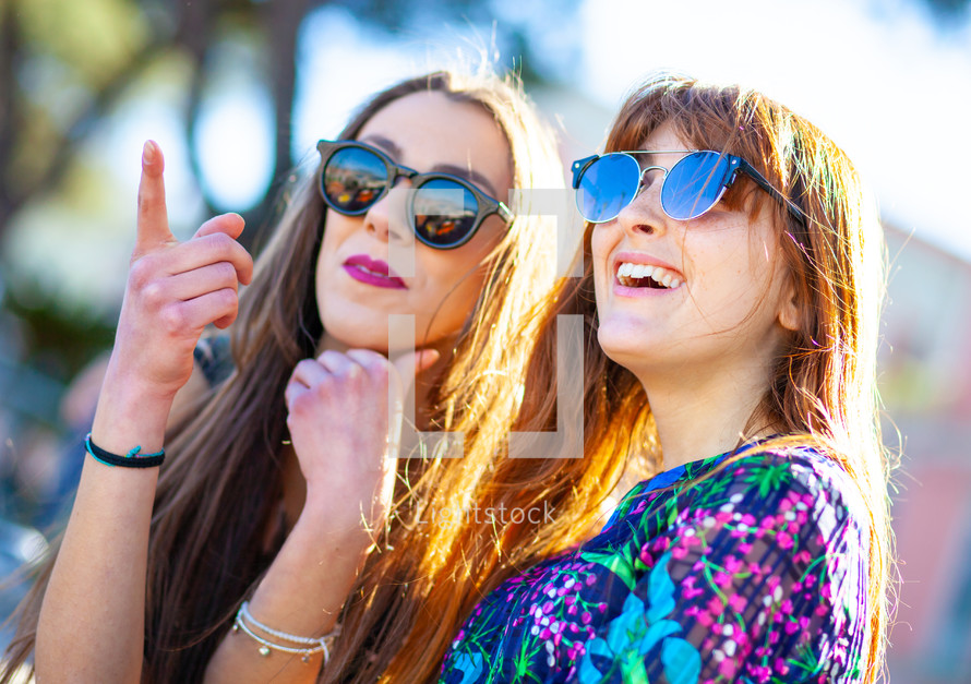 Women smiling with sunglasses