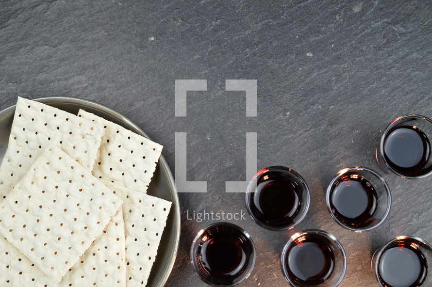 unleavened bread and communion wine cups 