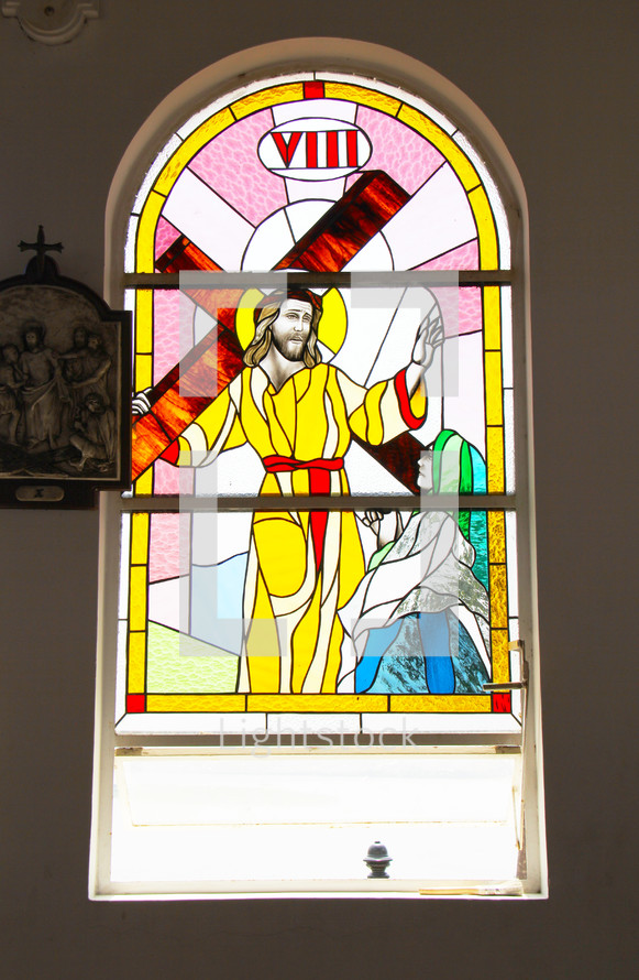 Stained glass window depicting Stations of the Cross. Number 8