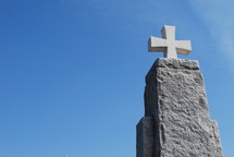 A statue with a cross