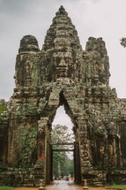 face carved in stone in temple ruins in Cambodia 