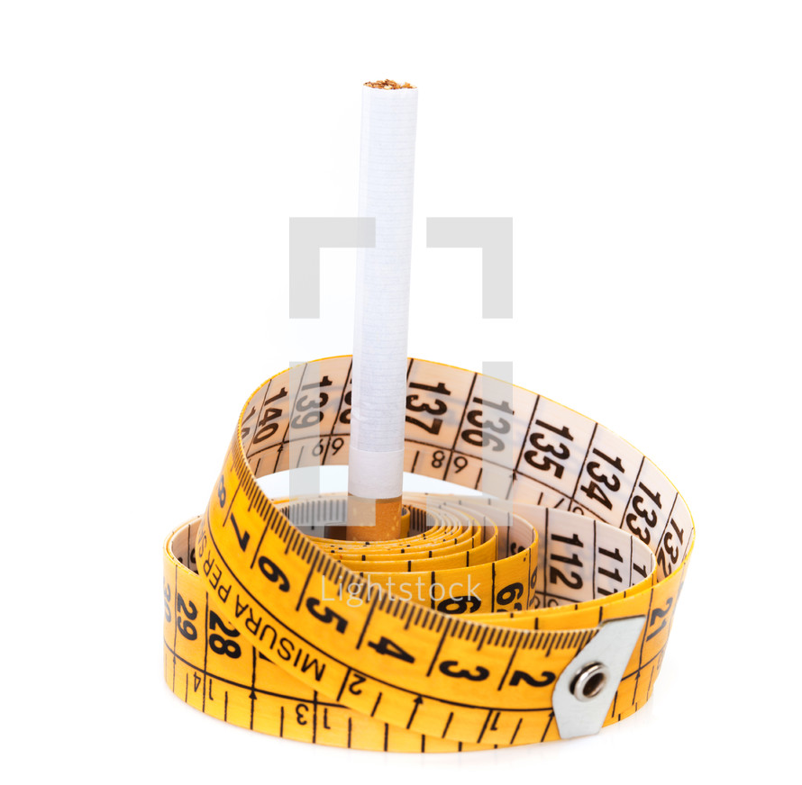 cigarette and Yellow measuring tape isolated on white background