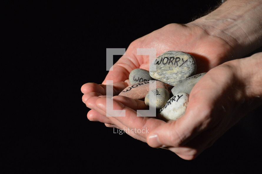 Jesus cares for our worries and his hands are holding our worries in the symbols of stones. 
worry, worries, anxiety, anxieties, stone, stones, hands, hand, care, caring, give, giving, deliver, delivering, concern, concerns, trouble, troubles, sorrow, sorrows, pain, fear, concernment, problem, problems, free, freeing, release, releasing, rescue, rescuing, bother, symbol, figure, burden, load, oppressiveness, oppressive, stress, affliction, letter, letters, write, written, writing, pebbles, pebble
