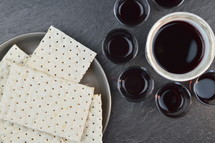 unleavened bread and communion wine cups 