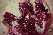 An open pomegranate full of seeds.