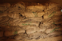 stacks of burlap sacs 