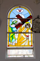 Stained glass window depicting Stations of the Cross. Number  5