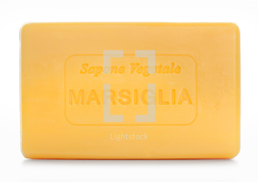 Bar of natural soap of "marsiglia" isolated on white