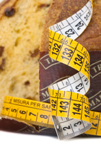 Panettone with meter, diet concept after Christmas.