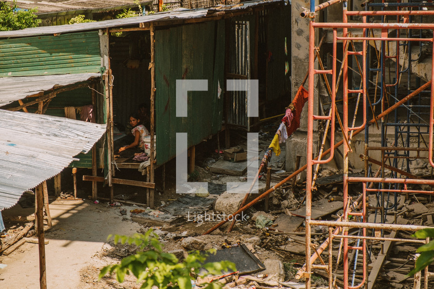 The poor living in shanties in Thailand. 
