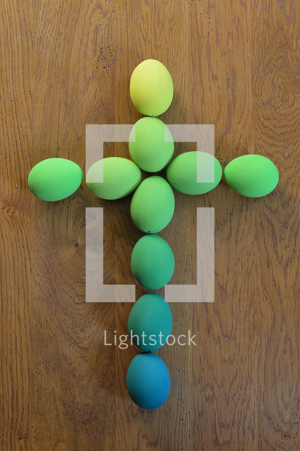 Cross out of green painted Easter eggs. 
