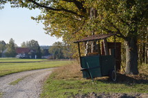 rural dirt road and old cart 