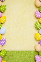 Easter egg border on yellow and green 