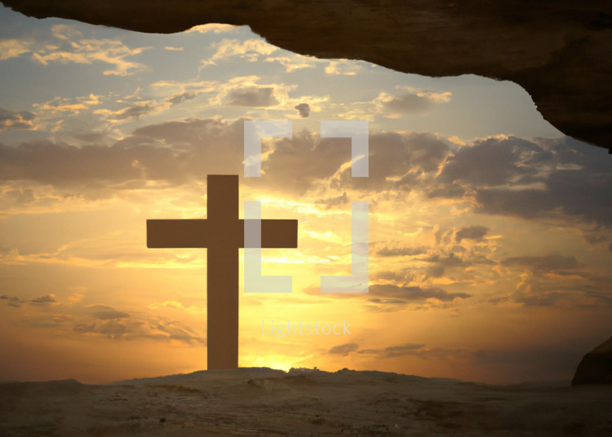 Cross viewed at sunrise from an empty tomb