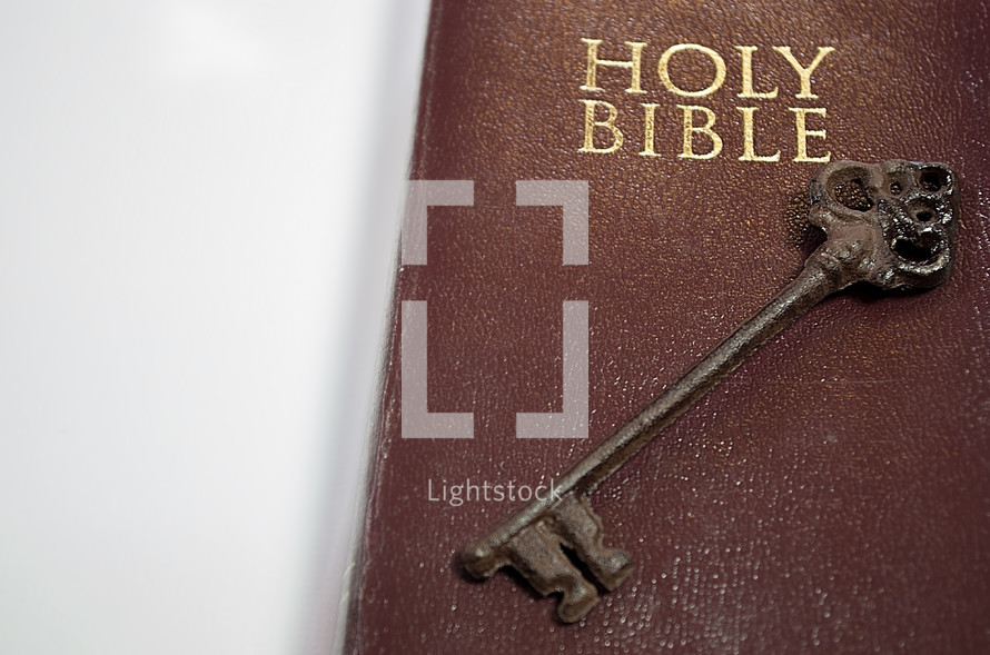 Skeleton key on the cover of a Bible 