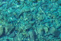 rocks under shallow water