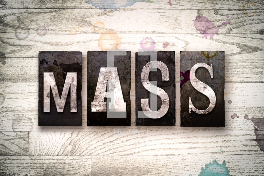 word mass on wood background 