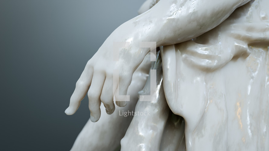 A white marble sculpture hand.