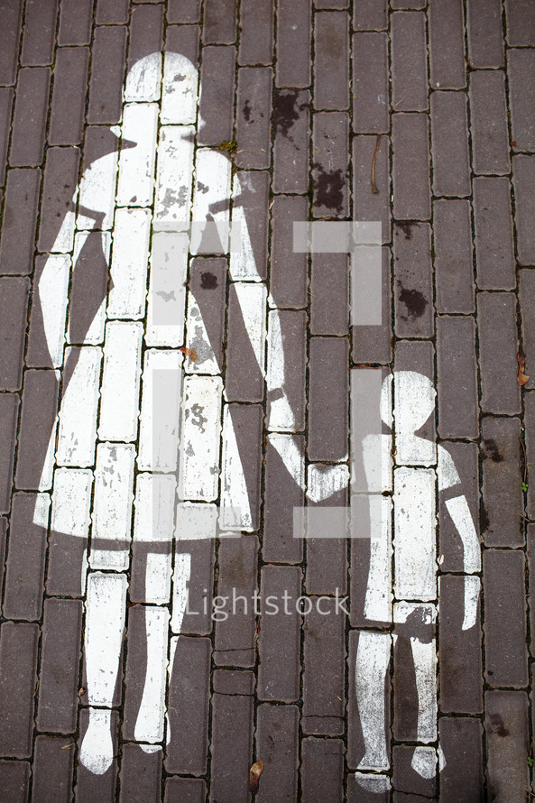 Road sign mother and a child