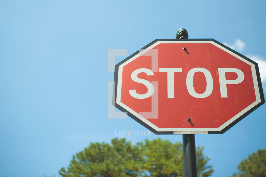 stop sign and blue sky 