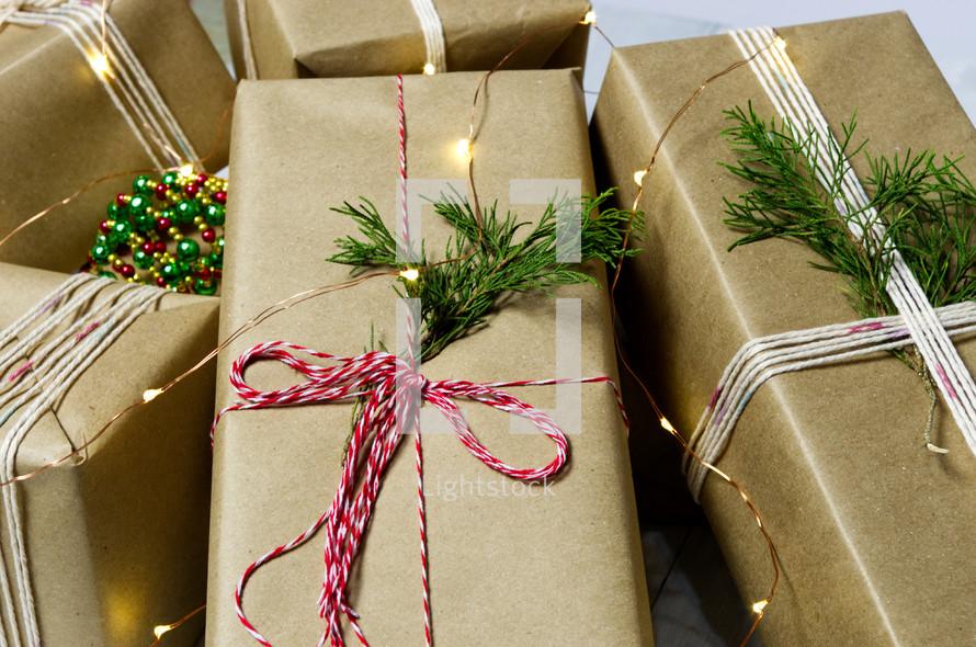 wrapped gifts in brown paper 