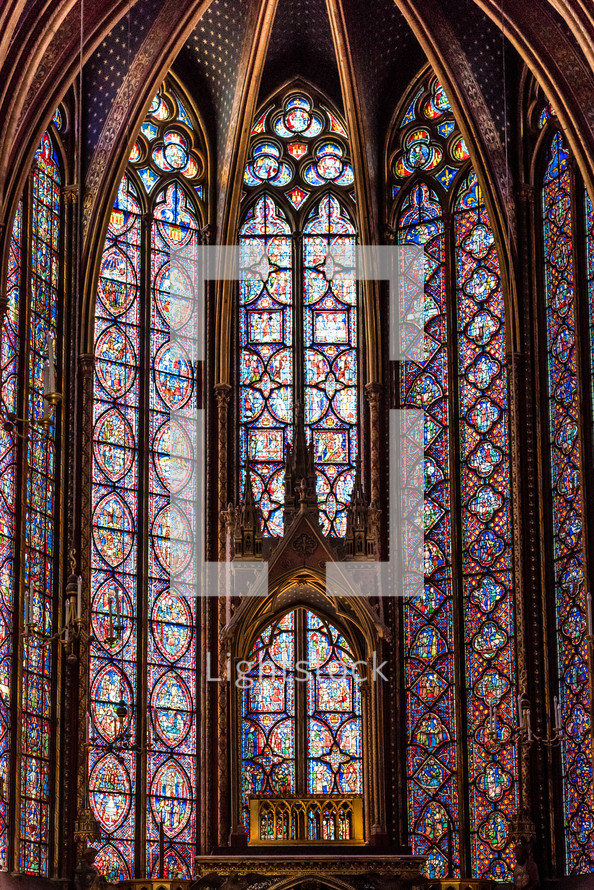 medieval stained glass windows in a cathedral 