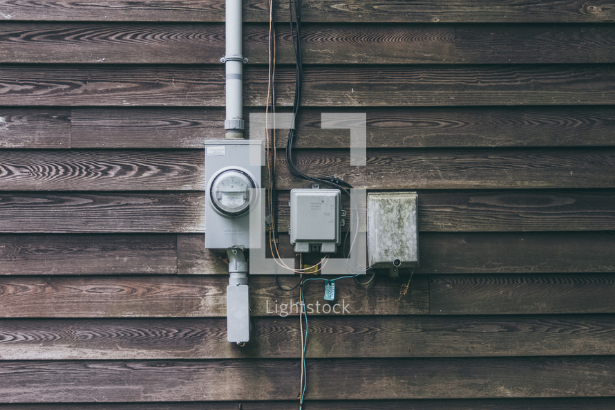 electric meter on an exterior wall 