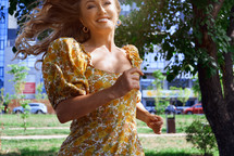 Woman running in a dress