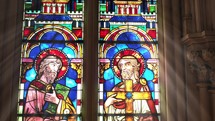 Gothic window with saintly images.
