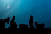 Mary, Joseph, and baby Jesus silhouettes 