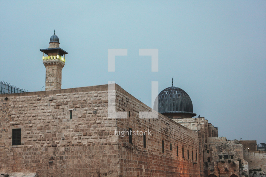 an evening shot of this mosque near the western wall