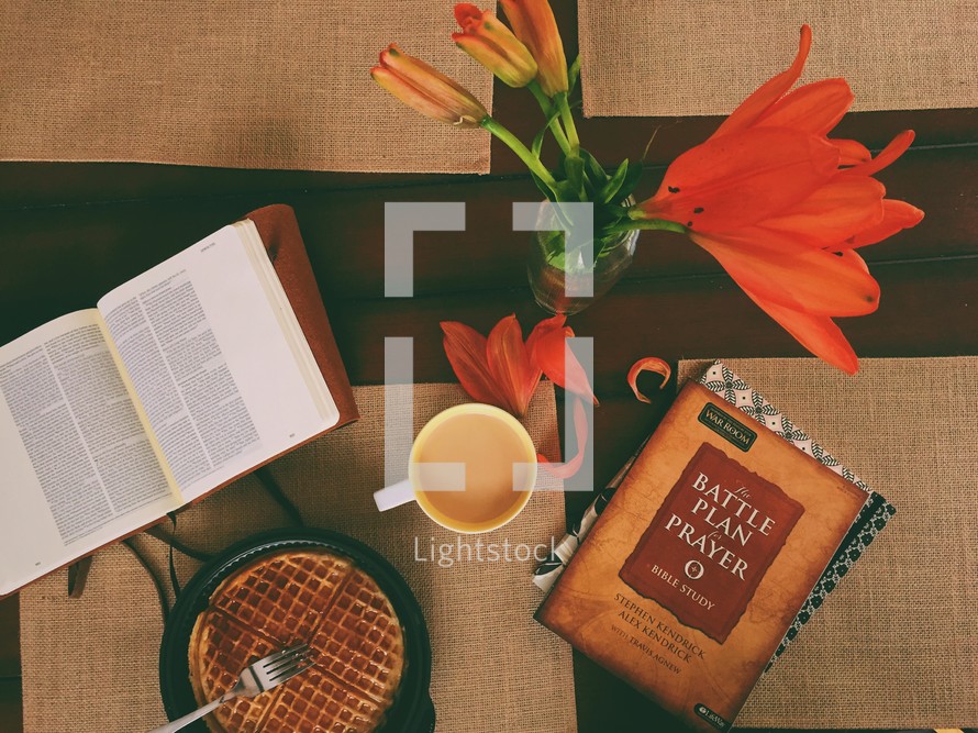 Breakfast waffles and Bible study books.