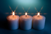 flames on three candles 