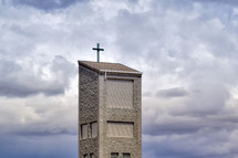 church steeple against a cloudy sky 