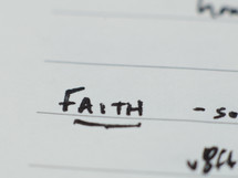 "Faith" written in ink on notebook paper.