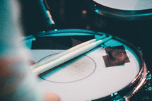 drum sticks on a  drum 