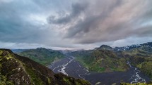 Evening clouds flying over Iceland mountains landscape. Time lapse
