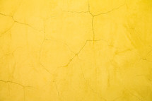 yellow cracked wall background 