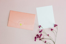 flowers, blank paper, and envelope 