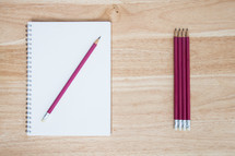 pencils on a sketchbook 