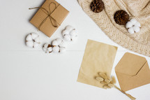 cotton and envelope with paper on a white background 