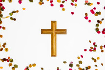 cross and fall leaves 